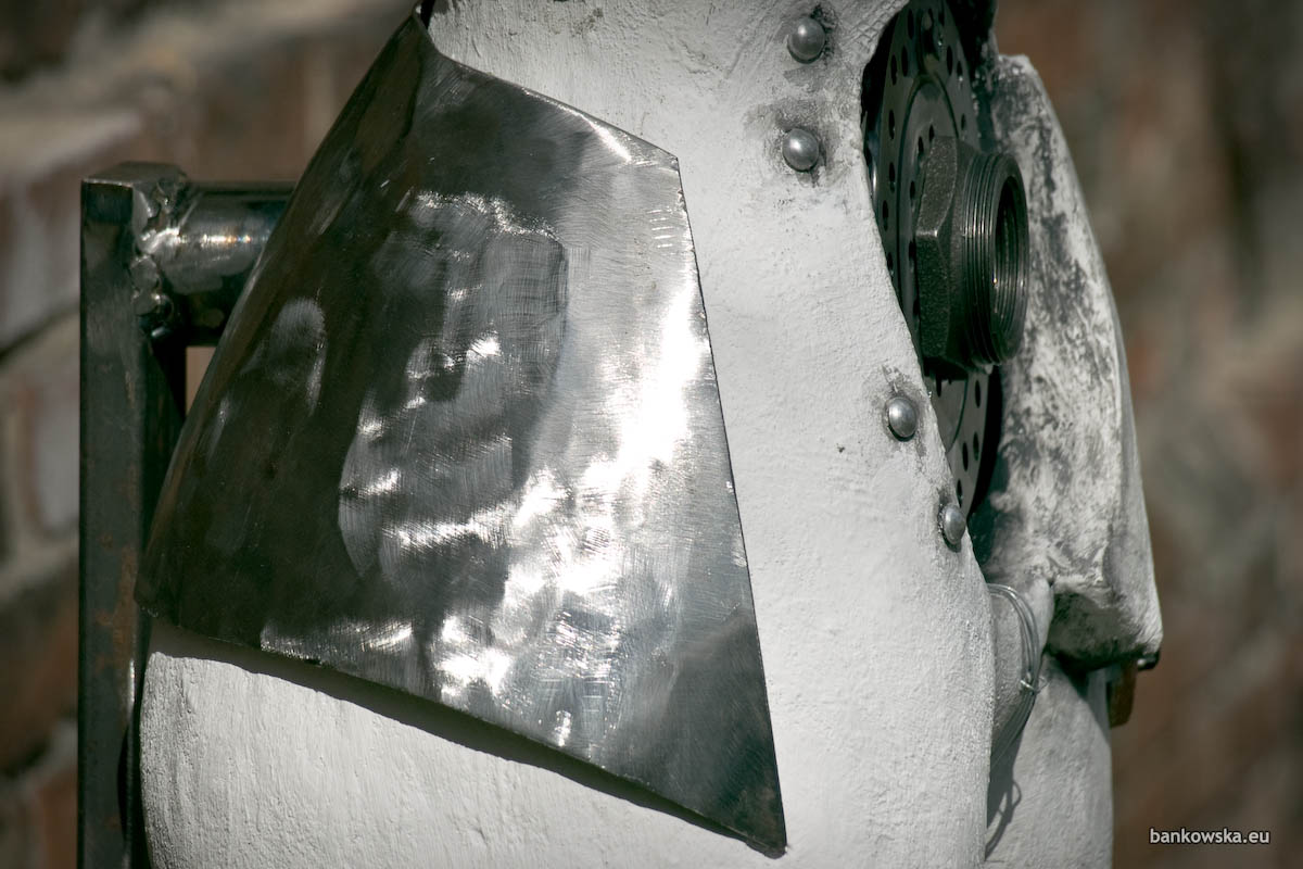A contemporary sculpture presenting the female body as an interface shaped by technology and pressure.
